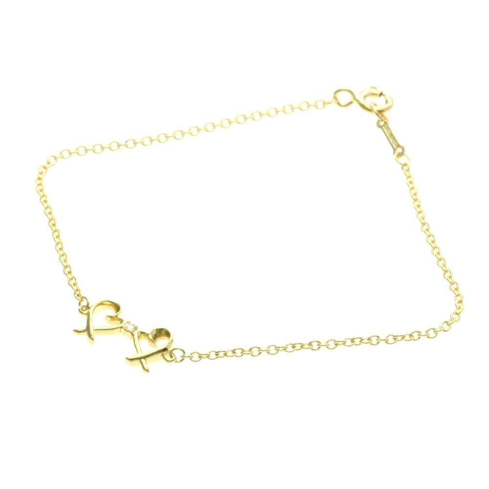 Tiffany & Co. Paloma Picasso Double Loving Heart 18K Yellow Gold and Diamond